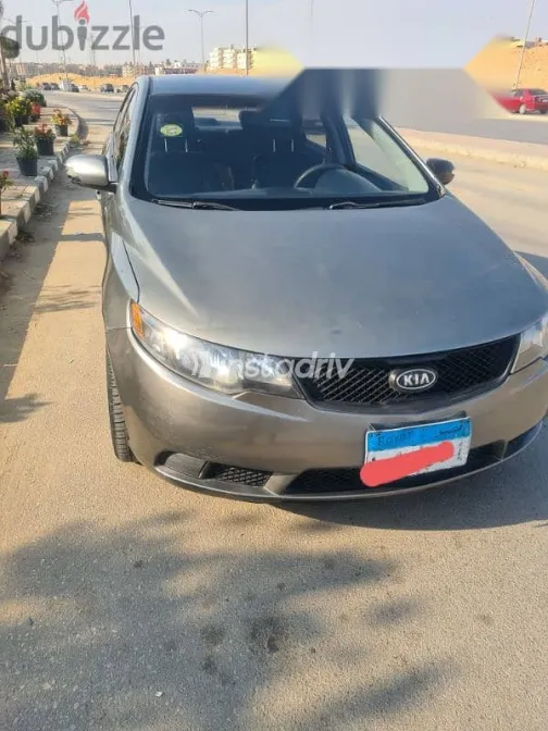 كيا سيراتو 2010 رمادي مستعملة للبيع - 1