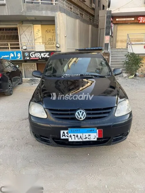 فولكس فاغن كروس 2006 أسود مستعملة للبيع - 1