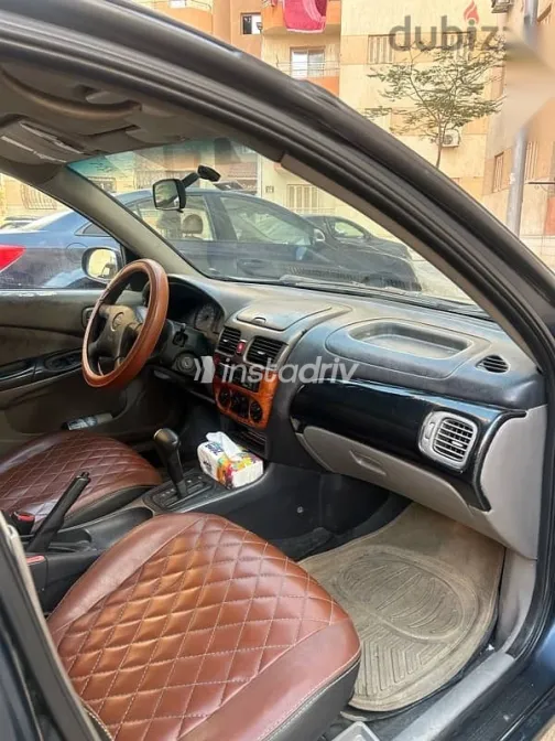 نيسان صنى 2002 أزرق غامق مستعملة للبيع - 5