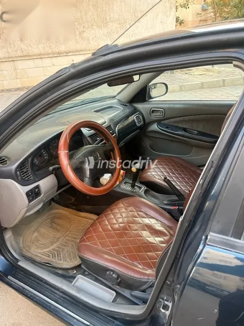 نيسان صنى 2002 أزرق غامق مستعملة للبيع - 8