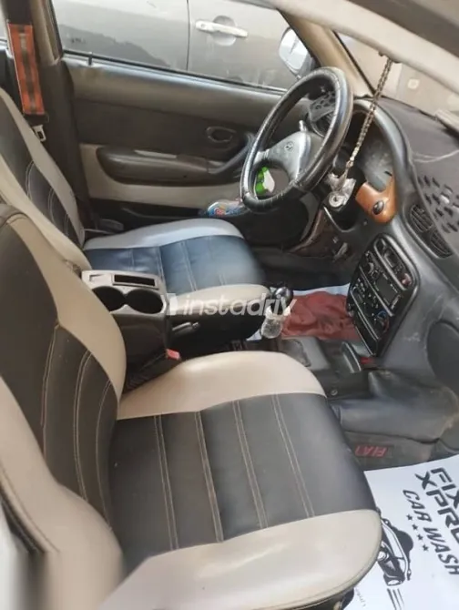 هيونداي اكسنت 2004 رمادي مستعملة للبيع - 6