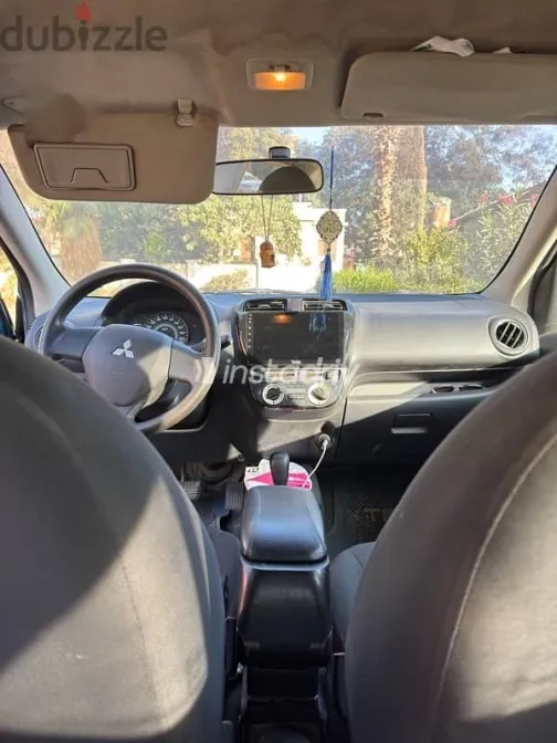 ميتسوبيشي اتراج 2014 أزرق غامق مستعملة للبيع - 5