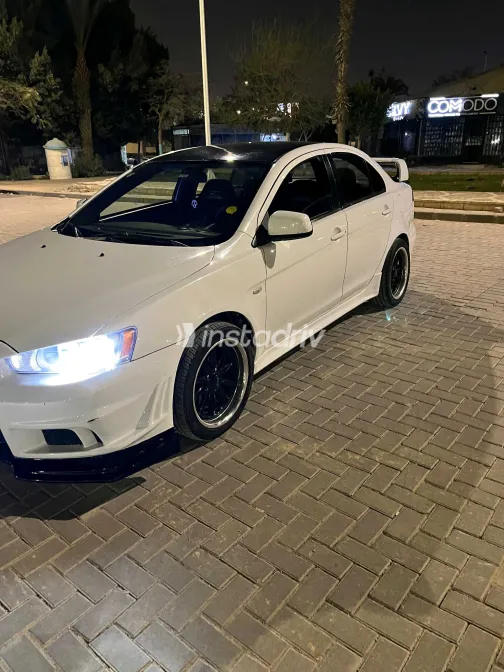 ميتسوبيشي لانسر 2014 أبيض مستعملة للبيع - 3