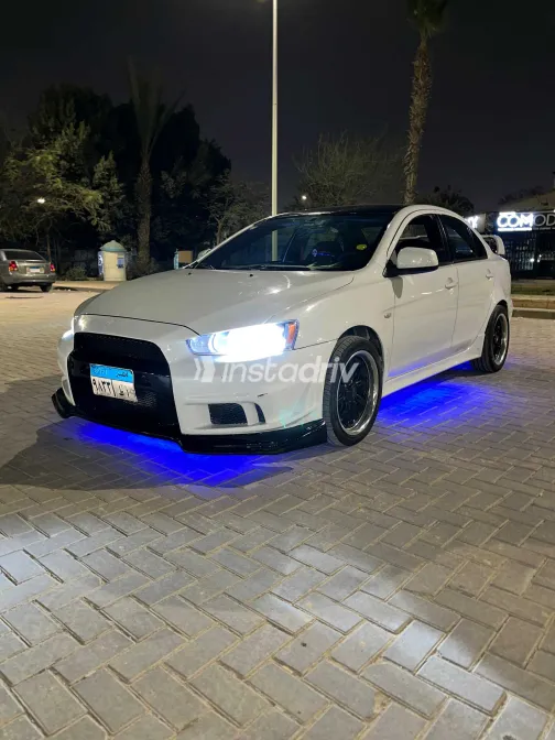 ميتسوبيشي لانسر 2014 أبيض مستعملة للبيع - 8