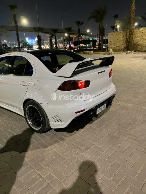 ميتسوبيشي لانسر 2014 أبيض مستعملة للبيع - 9