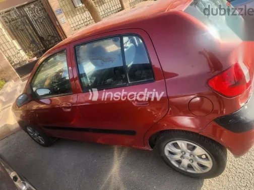 هيونداي جيتز 2010 أحمر مستعملة للبيع - 2