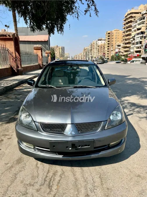 ميتسوبيشي لانسر 2007 أبيض مستعملة للبيع - 1