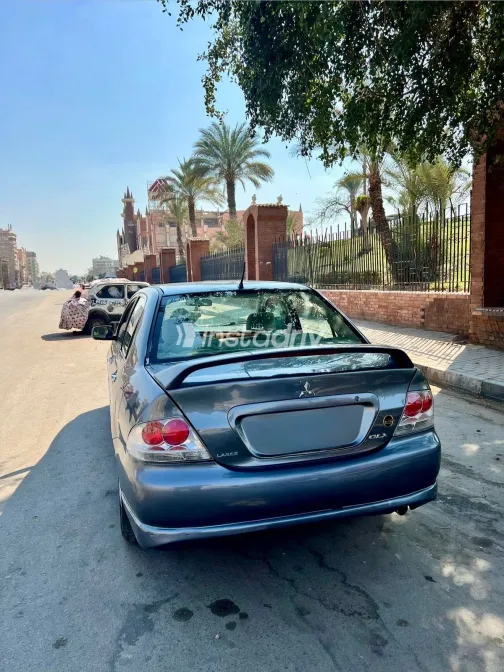 ميتسوبيشي لانسر 2007 أبيض مستعملة للبيع - 2