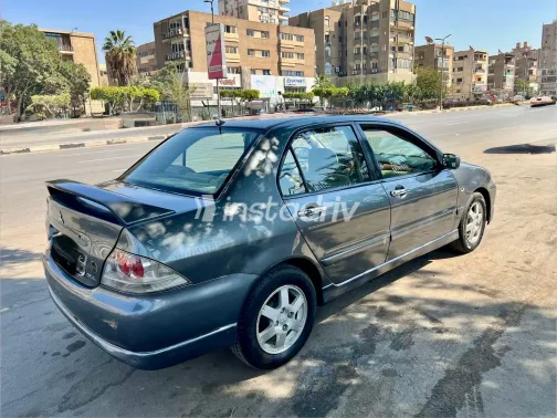 ميتسوبيشي لانسر 2007 أبيض مستعملة للبيع - 4