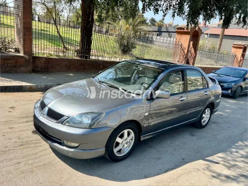 ميتسوبيشي لانسر 2007 أبيض مستعملة للبيع - 6