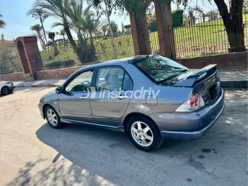 ميتسوبيشي لانسر 2007 أبيض مستعملة للبيع - 7