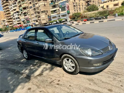 ميتسوبيشي لانسر 2007 أبيض مستعملة للبيع - 10