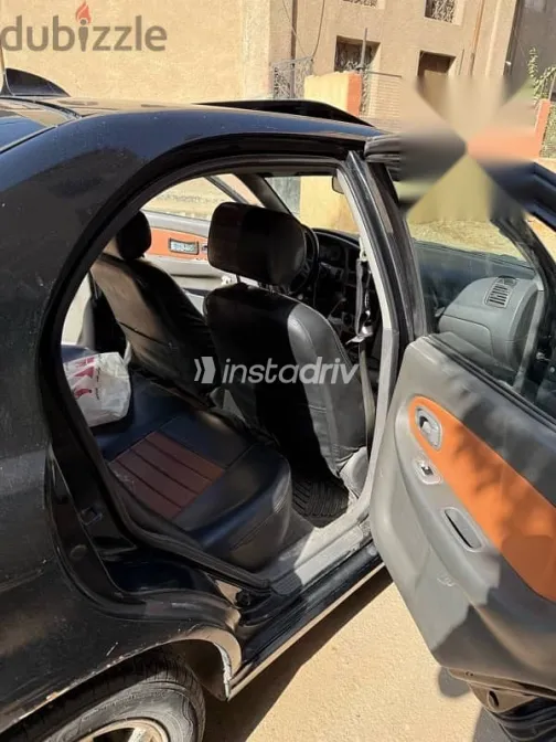 كيا سبكترا 2002 أسود مستعملة للبيع - 8