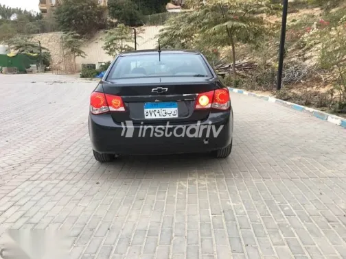 شيفروليه كروز 2010 أسود مستعملة للبيع - 3