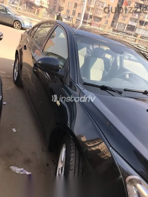 شيفروليه كروز 2010 أسود مستعملة للبيع - 5