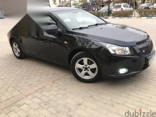 شيفروليه كروز 2010 أسود مستعملة للبيع