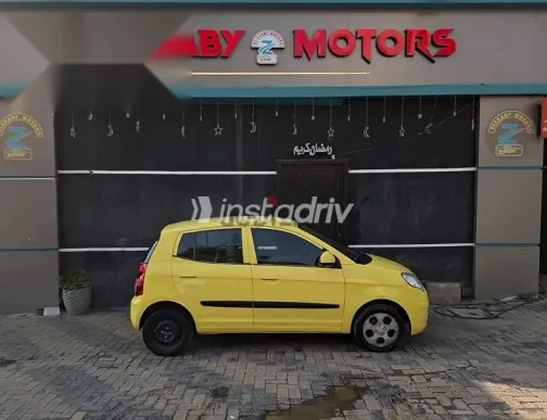 كيا بيكانتو 2010 أصفر مستعملة للبيع - 3