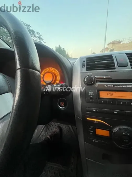 تويوتا كورولا 2009 فضي مستعملة للبيع - 8