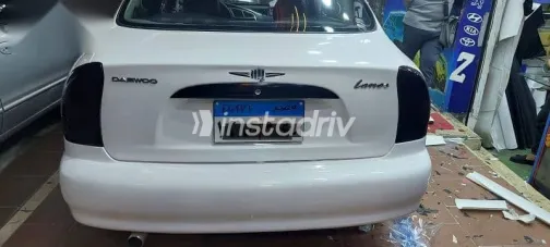 دايو لانوس 2001 أبيض مستعملة للبيع - 1