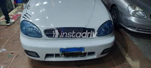 دايو لانوس 2001 أبيض مستعملة للبيع - 2