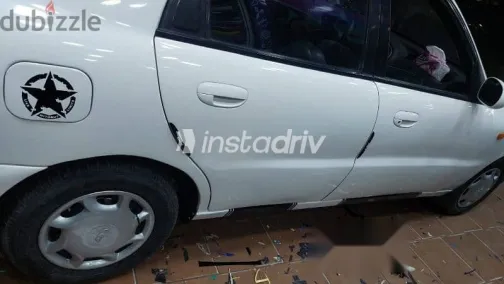 دايو لانوس 2001 أبيض مستعملة للبيع - 3