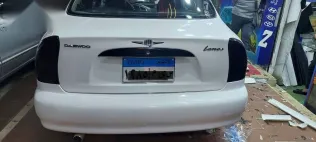 دايو لانوس 2001 أبيض مستعملة للبيع