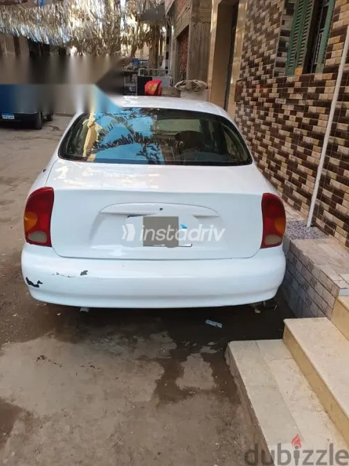 دايو لانوس 2009 أبيض مستعملة للبيع - 5