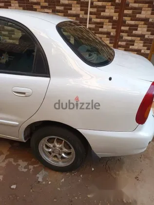 دايو لانوس 2009 أبيض مستعملة للبيع