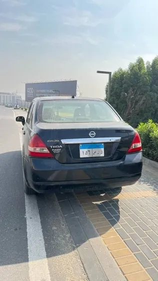 نيسان تيدا 2009 أسود مستعملة للبيع