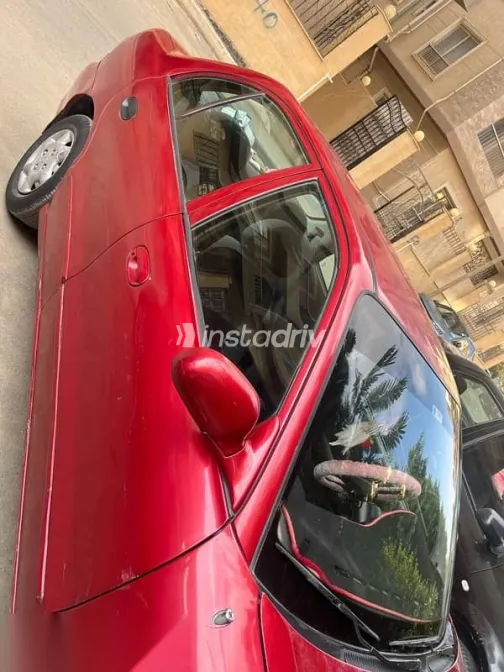 هيونداي اكسنت 2002 أحمر مستعملة للبيع - 2