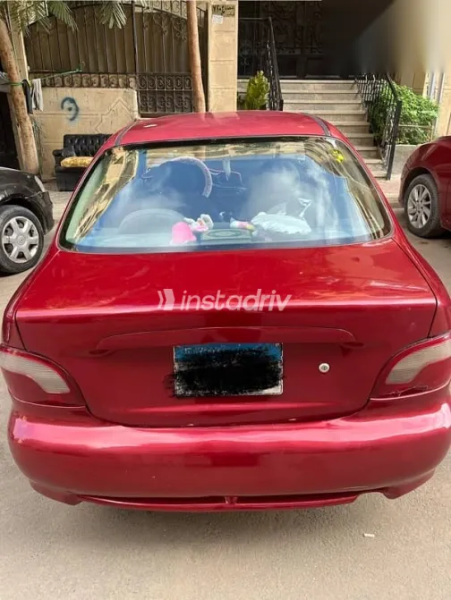 هيونداي اكسنت 2002 أحمر مستعملة للبيع - 9