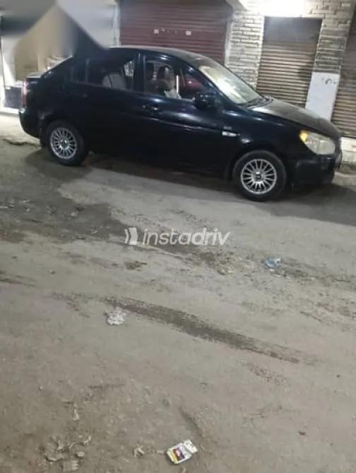 هيونداي اكسنت 2010 أسود مستعملة للبيع - 1