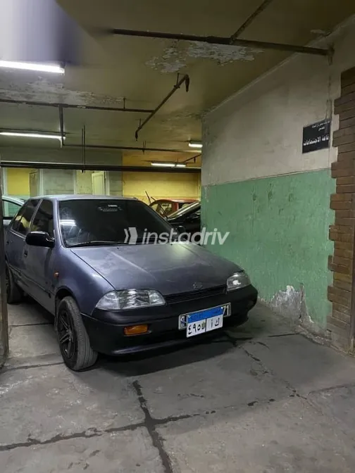 سوزوكى سويفت 1995 رمادي مستعملة للبيع - 1