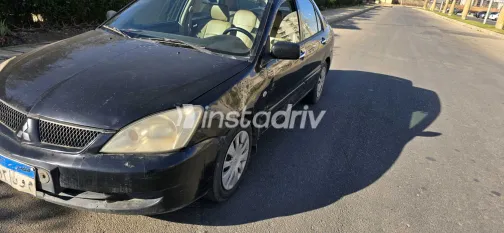 ميتسوبيشي لانسر 2009 أبيض مستعملة للبيع - 2