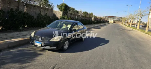 ميتسوبيشي لانسر 2009 أبيض مستعملة للبيع - 5