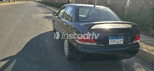 ميتسوبيشي لانسر 2009 أبيض مستعملة للبيع - 6