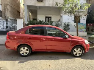 شيفروليه افيو 2015 أحمر مستعملة للبيع