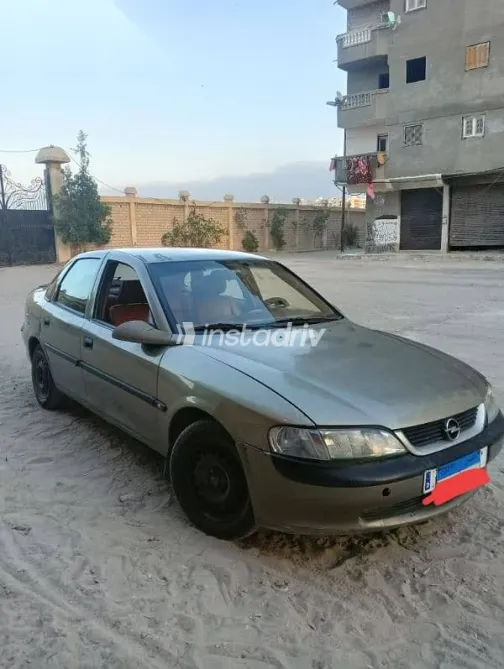 اوبل فيكترا 1997 ذهبي مستعملة للبيع - 9