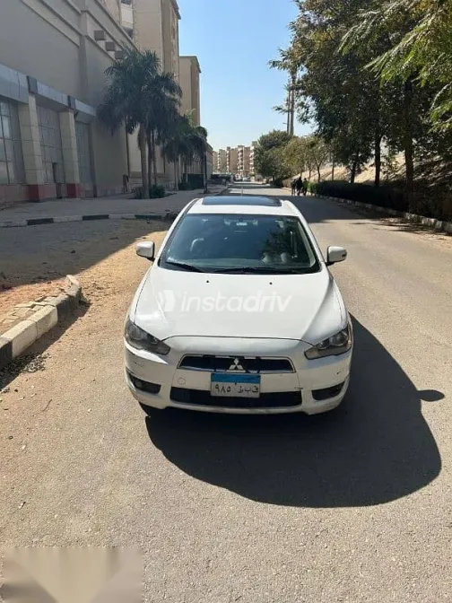ميتسوبيشي لانسر 2016 أبيض مستعملة للبيع - 2