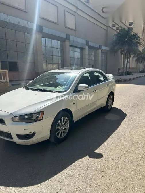 ميتسوبيشي لانسر 2016 أبيض مستعملة للبيع - 3