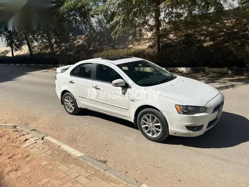 ميتسوبيشي لانسر 2016 أبيض مستعملة للبيع - 4