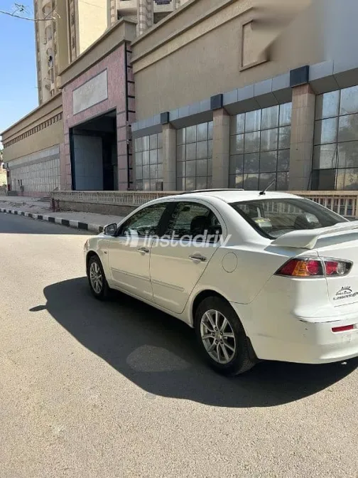 ميتسوبيشي لانسر 2016 أبيض مستعملة للبيع - 6