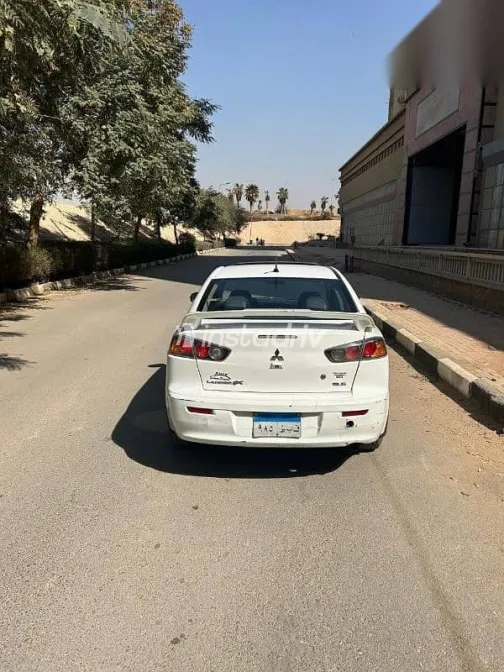 ميتسوبيشي لانسر 2016 أبيض مستعملة للبيع - 7