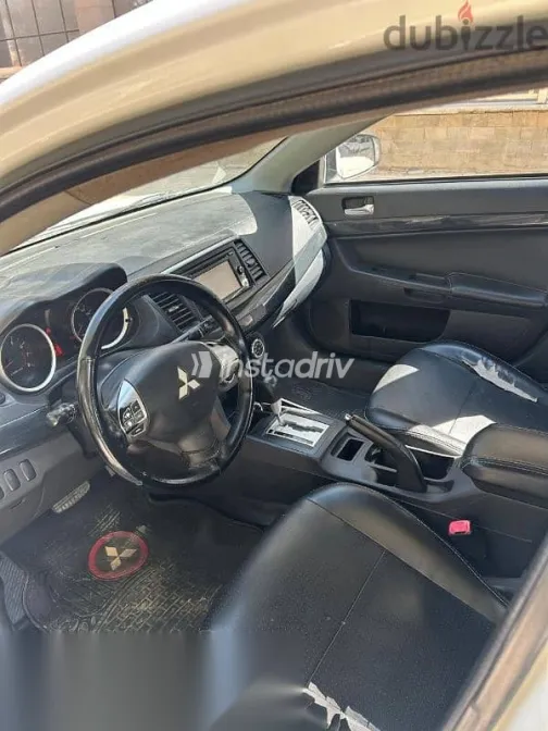 ميتسوبيشي لانسر 2016 أبيض مستعملة للبيع - 8