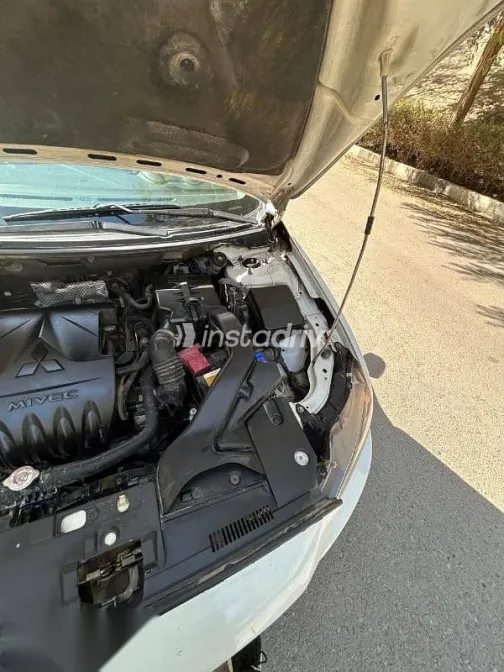 ميتسوبيشي لانسر 2016 أبيض مستعملة للبيع - 10