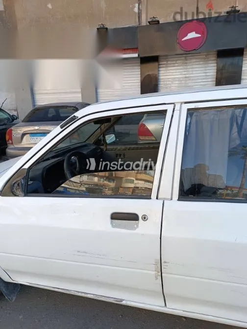 كيا برايد 1996 أبيض مستعملة للبيع - 1