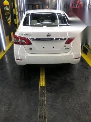 نيسان سنترا 2016 أبيض مستعملة للبيع