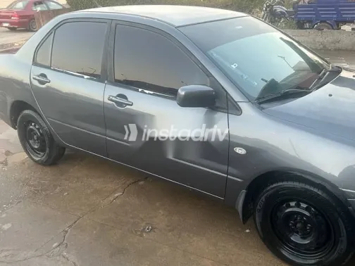 ميتسوبيشي لانسر 2007 رمادي مستعملة للبيع - 1