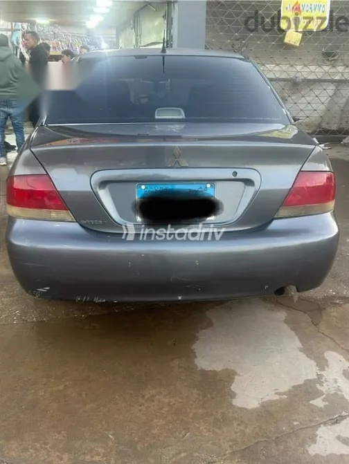 ميتسوبيشي لانسر 2007 رمادي مستعملة للبيع - 3