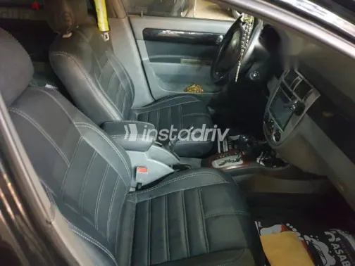 شيفروليه أوبترا 2010 أسود مستعملة للبيع - 1